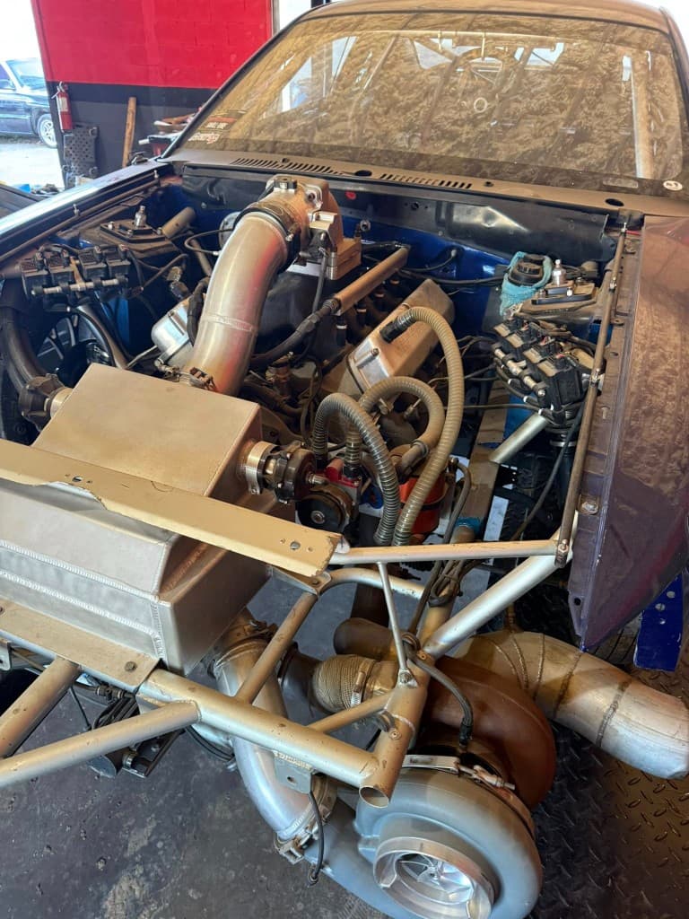 Tube chassis race car with single turbo