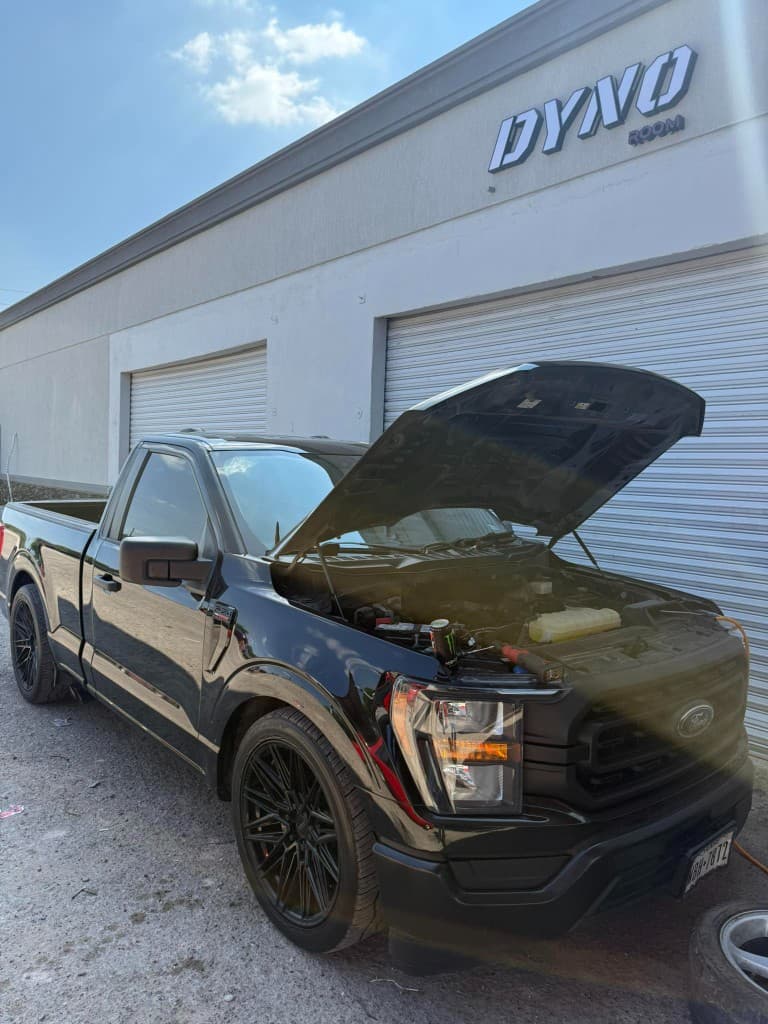 Black F-150 single cab outside the Dyno Room